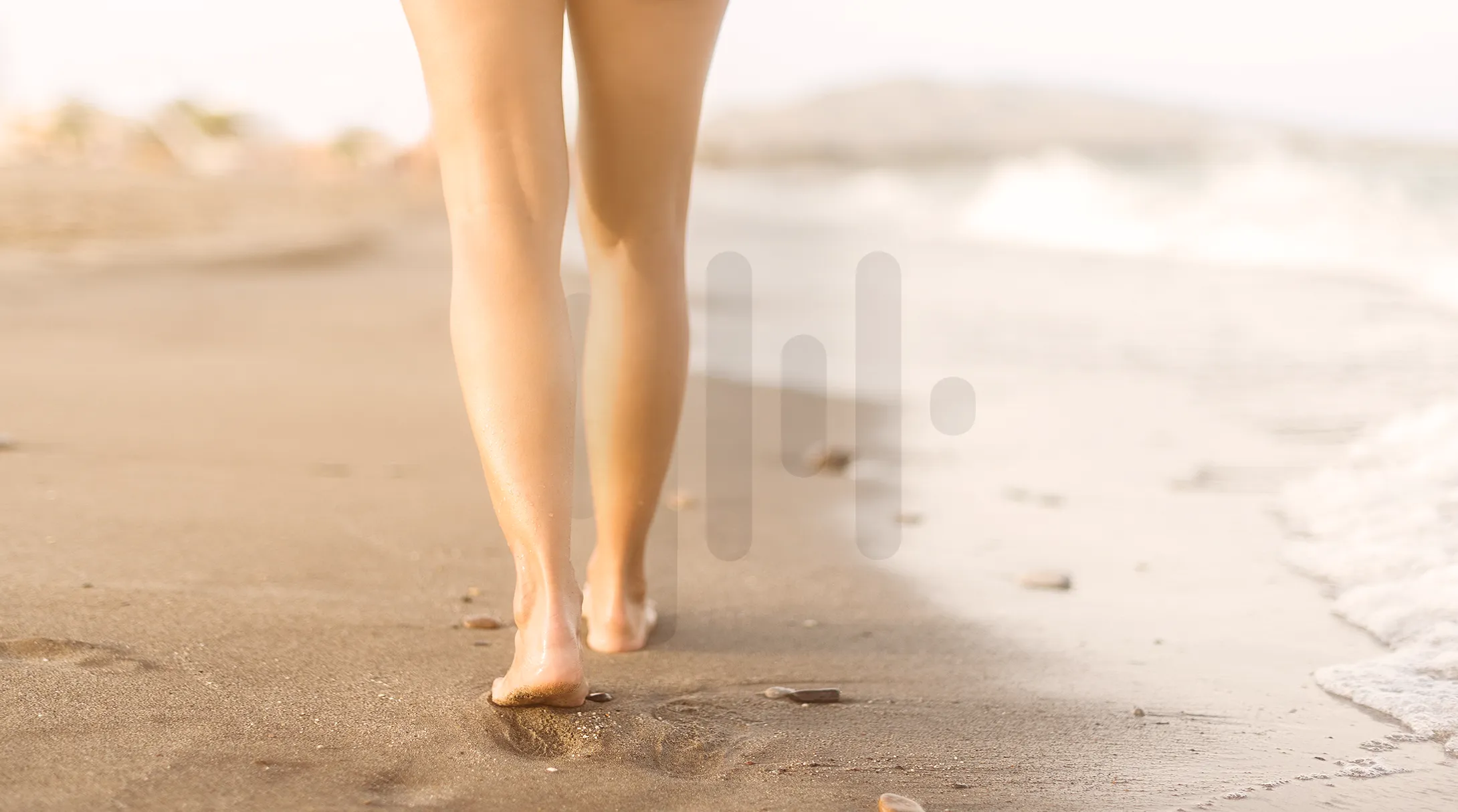 A sporty woman lying on the floor with tuun Resonate waves behind her